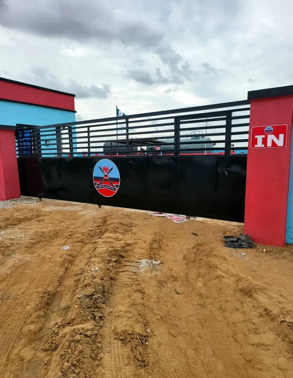 Entrance gate bearing the Nigerian Army Aviation crest